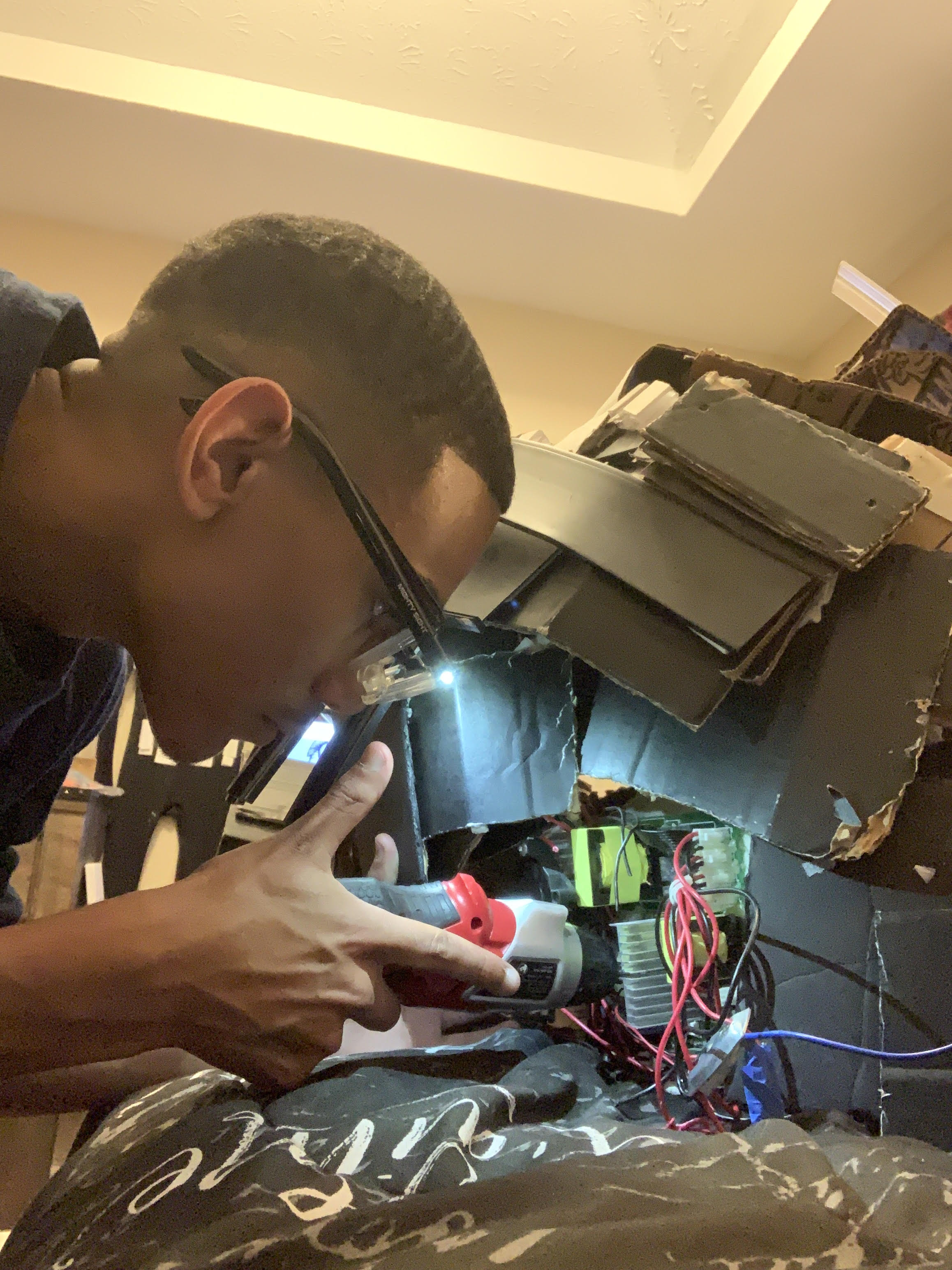 Ismael working on a creative project